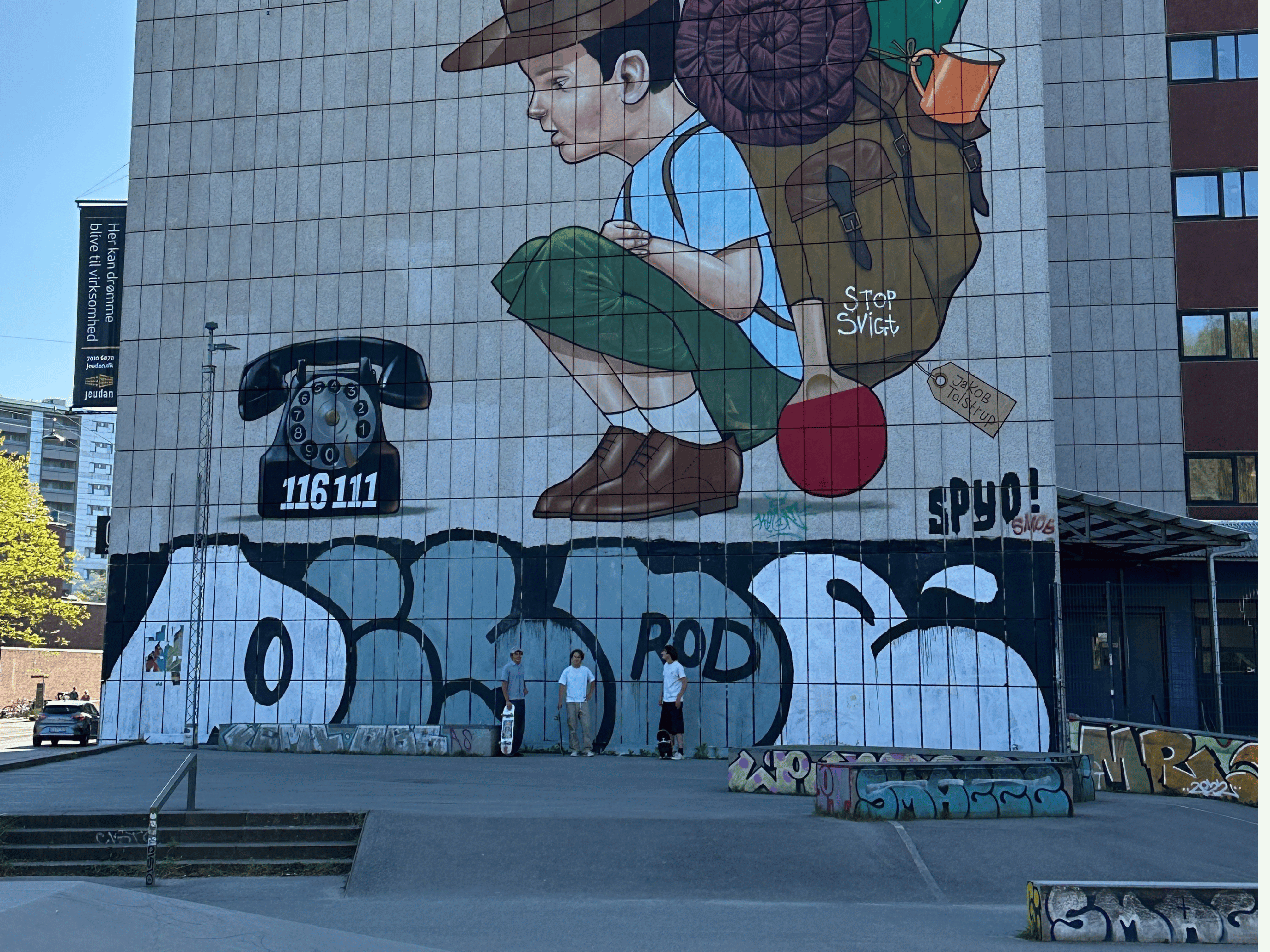 Street art mural in Nørrebro, Copenhagen, during a team-building event